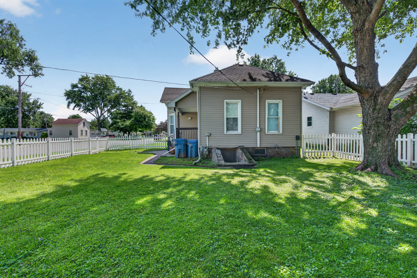 1128 Butler Street Morris, IL 60450 - Photo 26 of 28 a view of a house with a yard