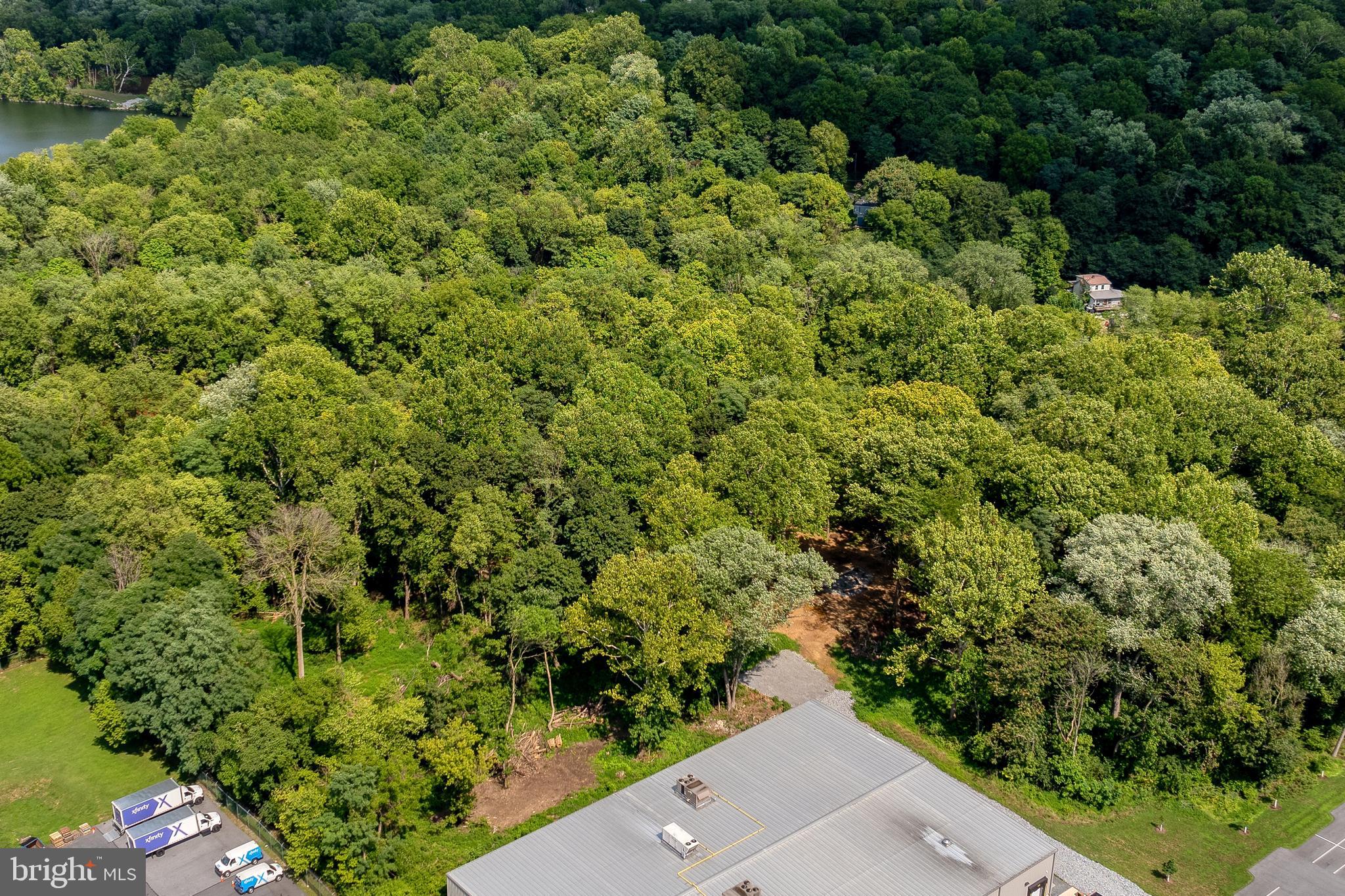 1153 South Duke Street Lancaster, PA 17602 - Photo 2 of 21 an aerial view of residential house with outdoor space and trees all around