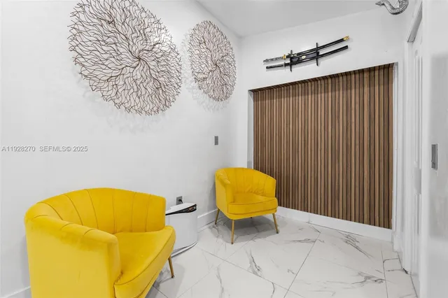 a bathroom with a mirror and a shower