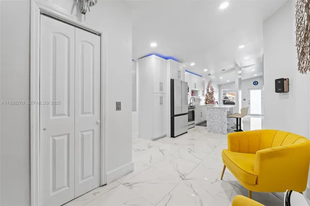 a view of kitchen and kitchen with furniture