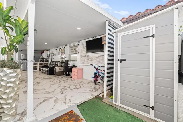 a view of balcony and furniture