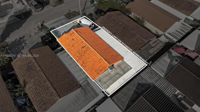 an aerial view of a house with a space