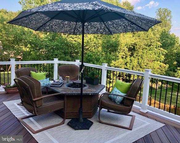 8527 Silverview Drive Lorton, VA 22079 - Photo 3 of 4 a view of a roof deck with furniture