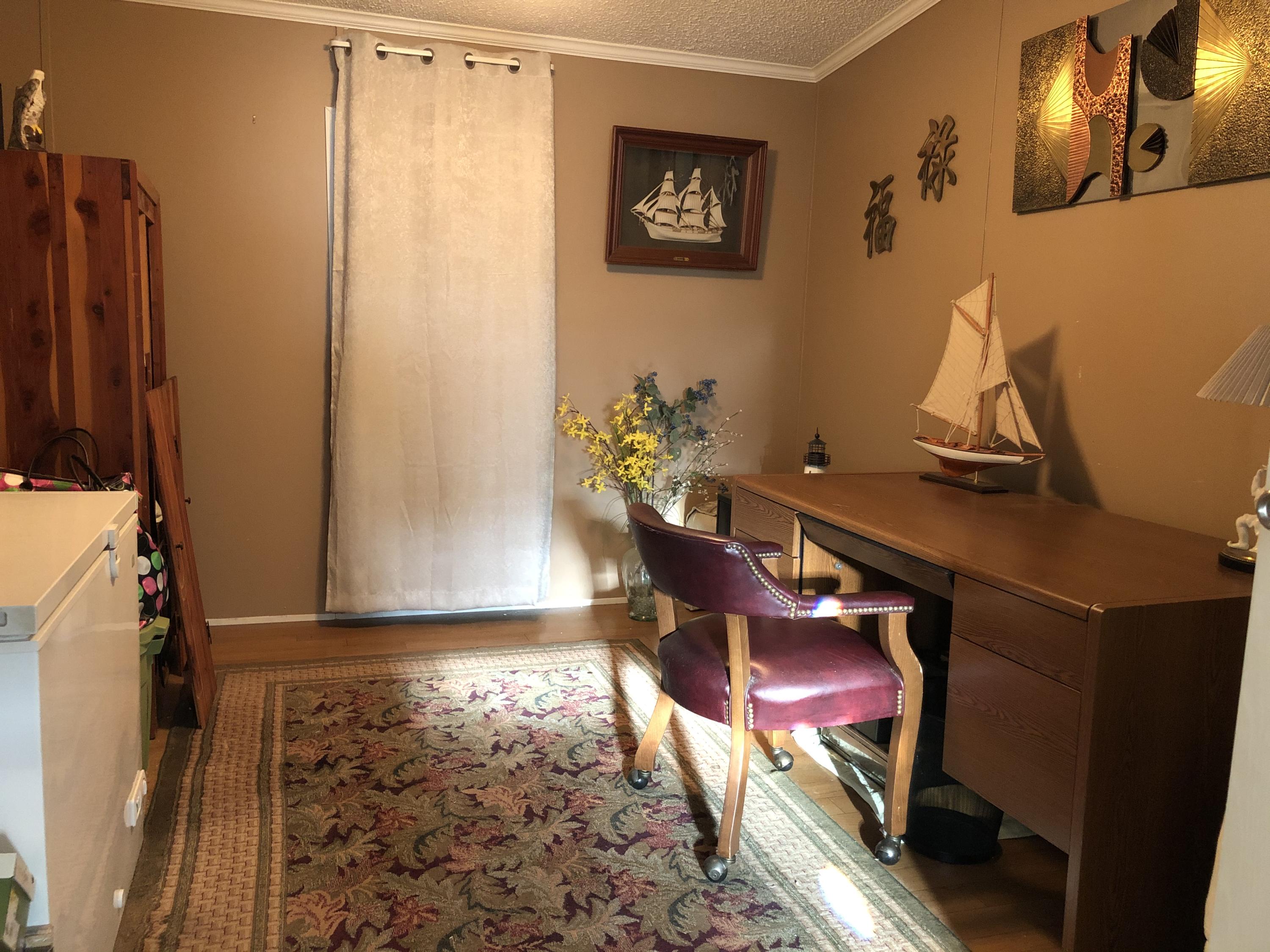22884 Neptune Road Boca Raton, FL 33428 - Photo 12 of 19 a workspace with furniture and window
