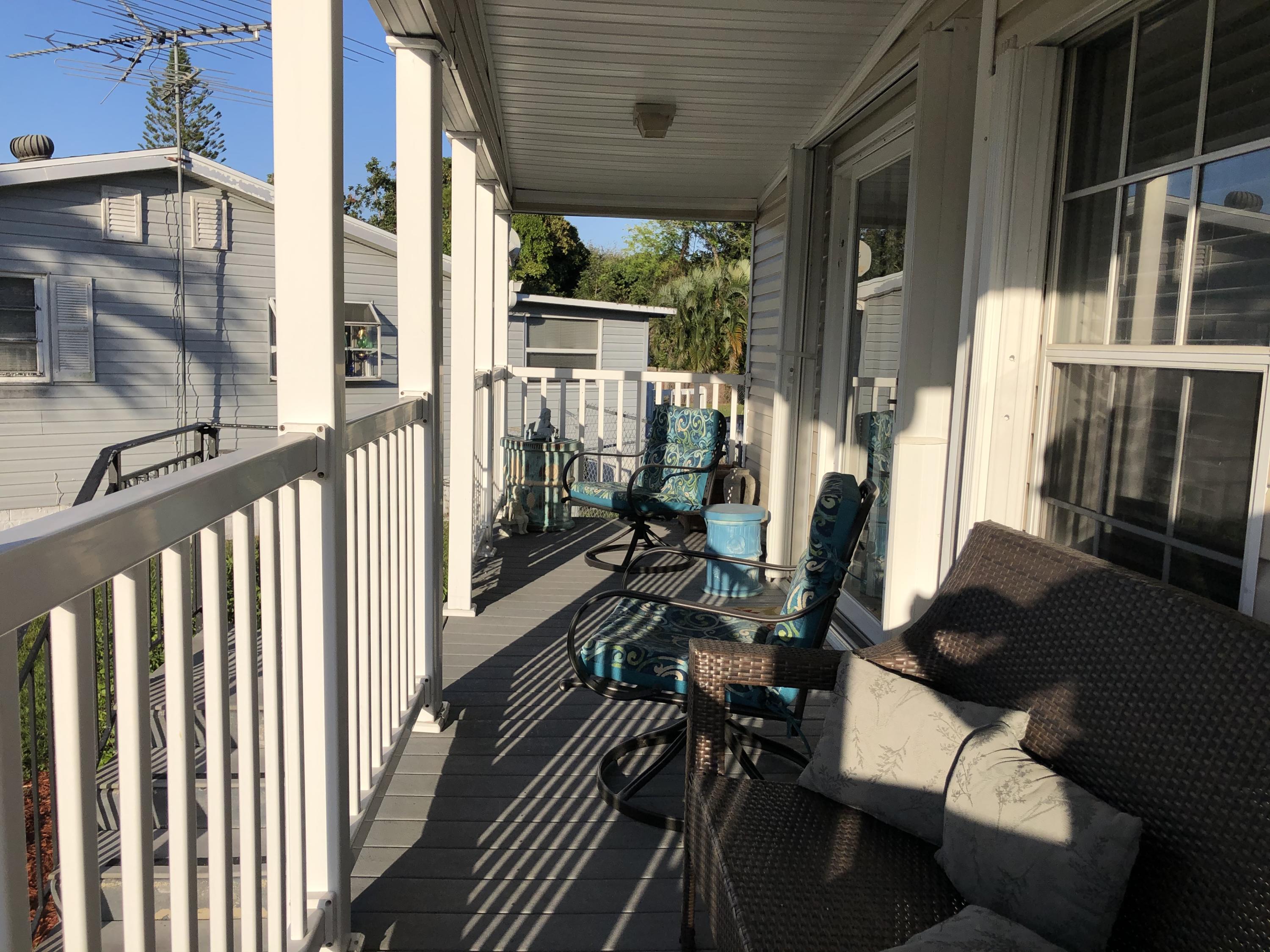 22884 Neptune Road Boca Raton, FL 33428 - Photo 3 of 19 a view of balcony and patio