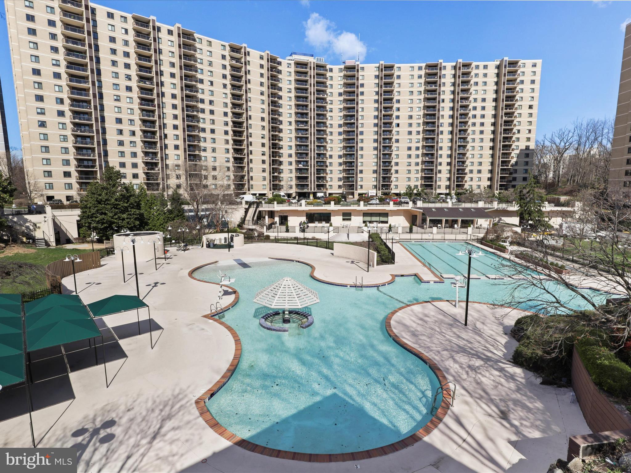205 Yoakum Parkway, Unit 1020 Alexandria, VA 22304 - Photo 38 of 62 a view of a swimming pool with outdoor seating