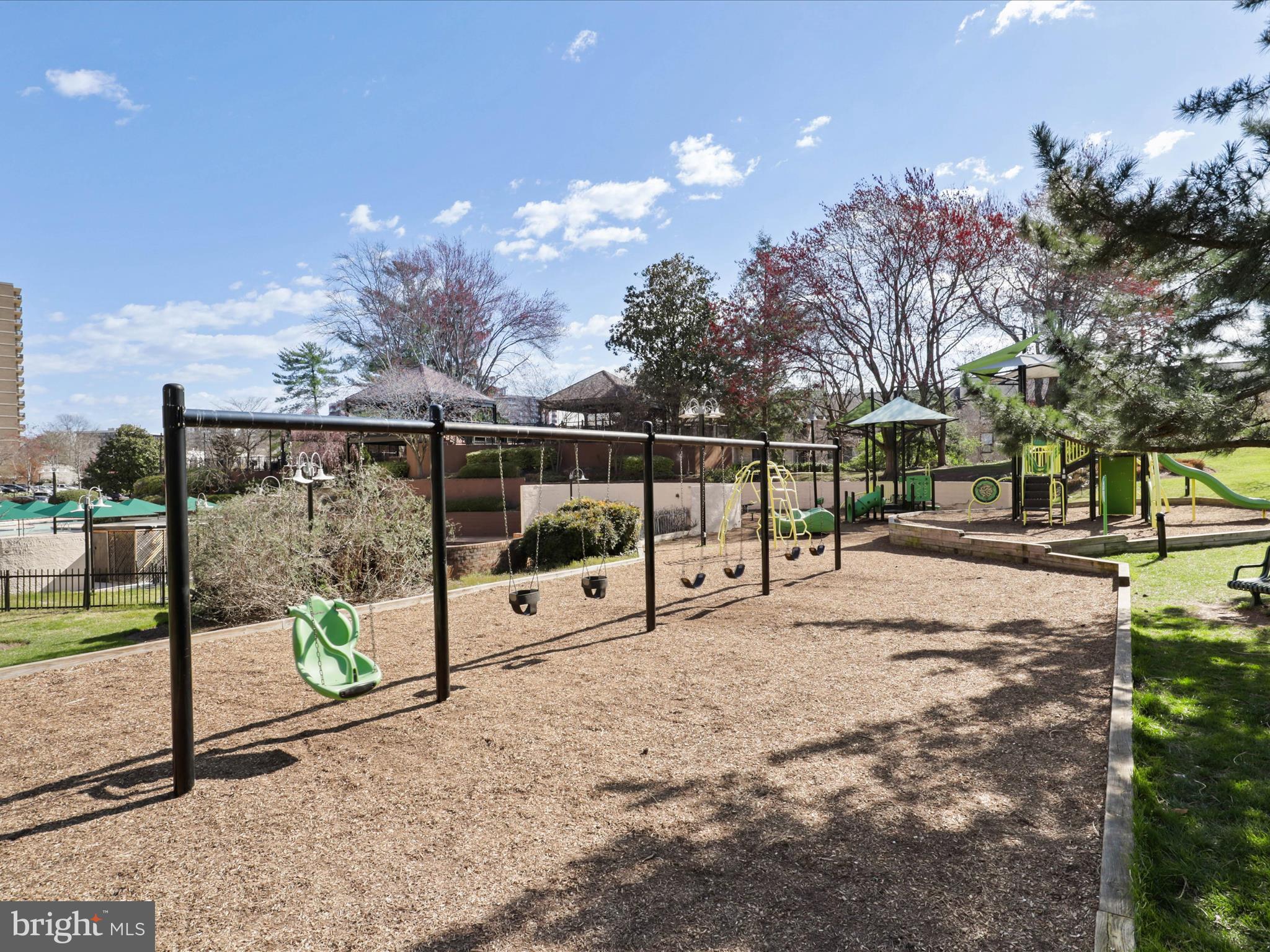 205 Yoakum Parkway, Unit 1020 Alexandria, VA 22304 - Photo 45 of 62 a view of pathway with a yard in front of the house