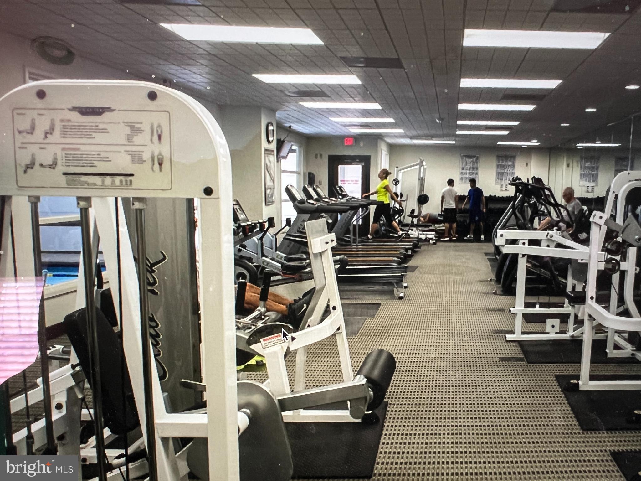 205 Yoakum Parkway, Unit 1020 Alexandria, VA 22304 - Photo 56 of 62 a view of a room with gym equipment