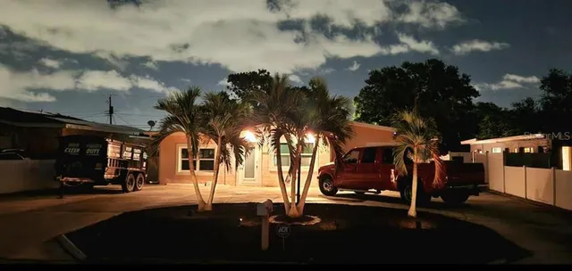 a front view of a house with yard