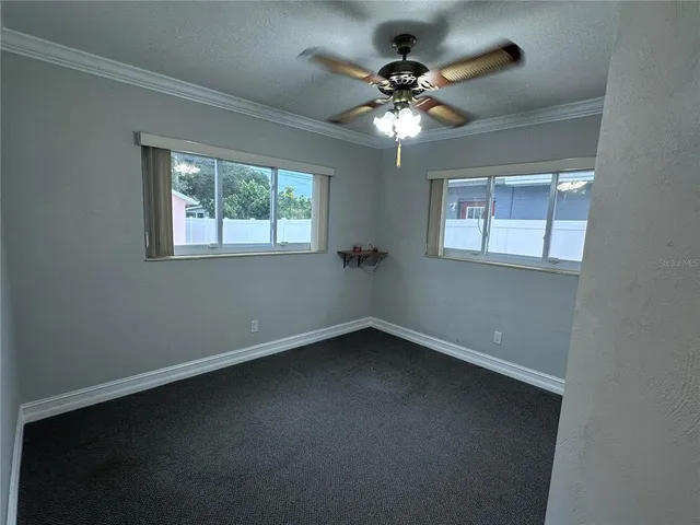 a utility room with dryer washer and a window