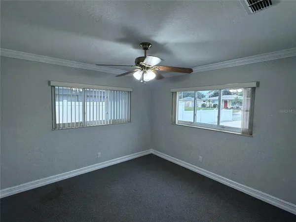 a view of a room that has a window in it