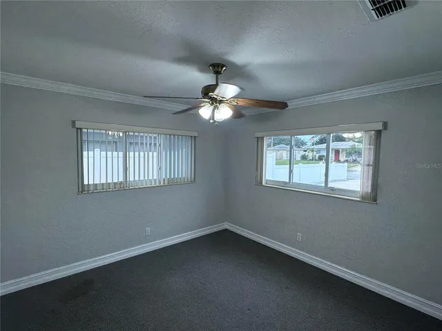 a view of a room that has a window in it
