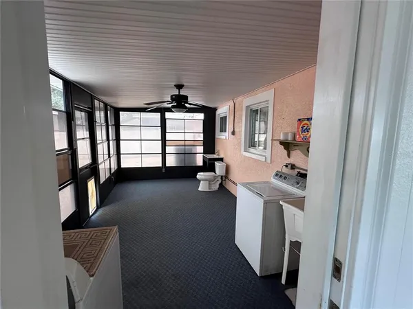 a view of a room with racks on the wall