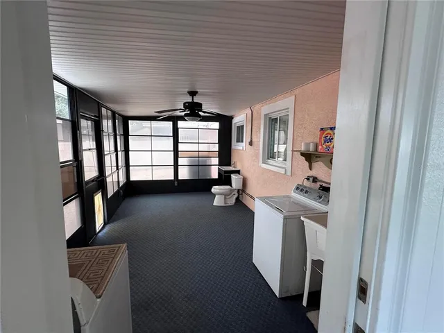 a view of a room with racks on the wall