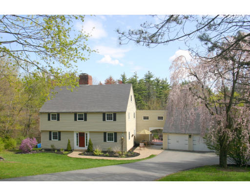 60 Ayer Road Harvard, MA 01451 - Photo 1 of 1 a front view of a house with garden