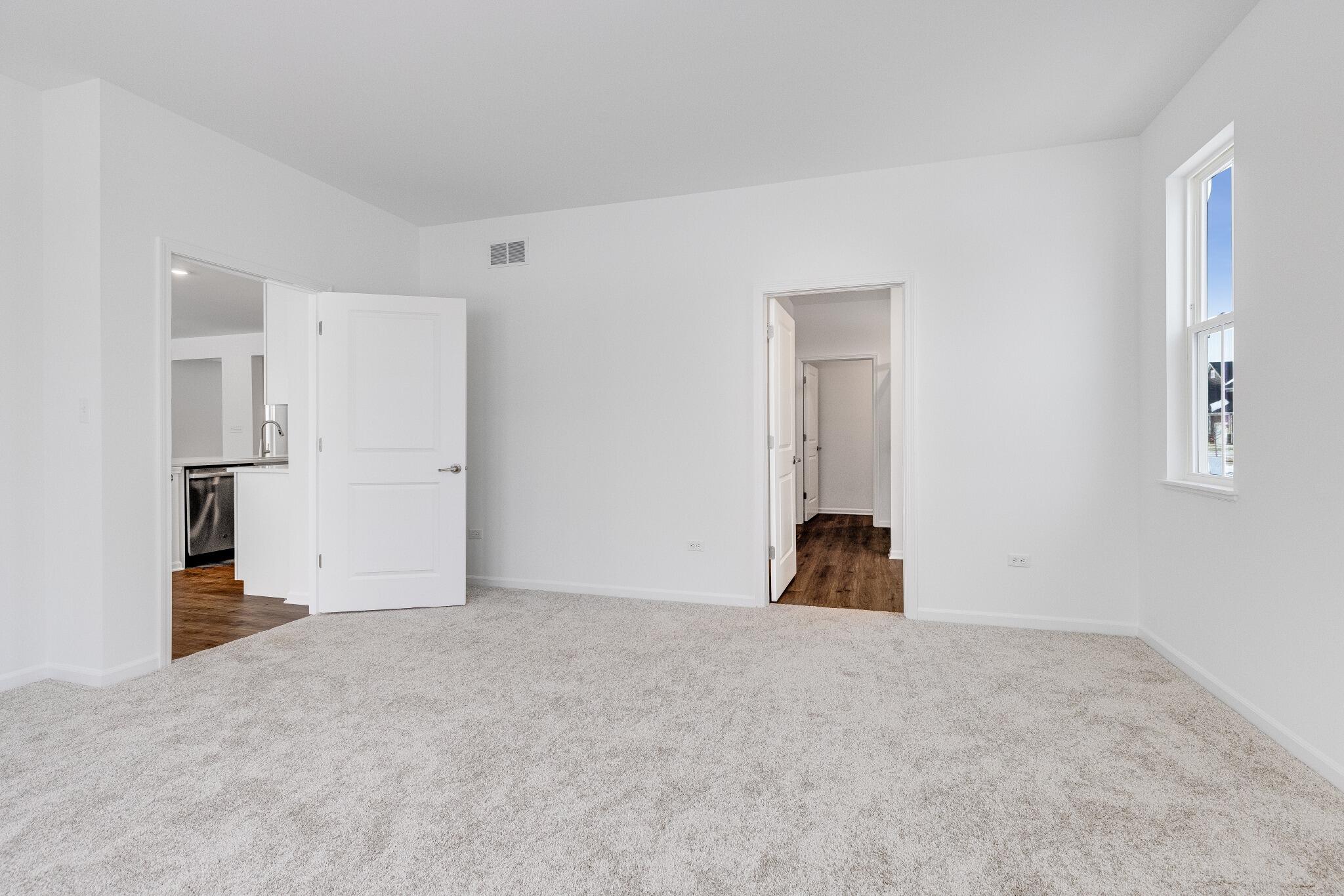 5948 East 112th Avenue Winfield, IN 46307 - Photo 17 of 36 a view of empty room with wooden floor