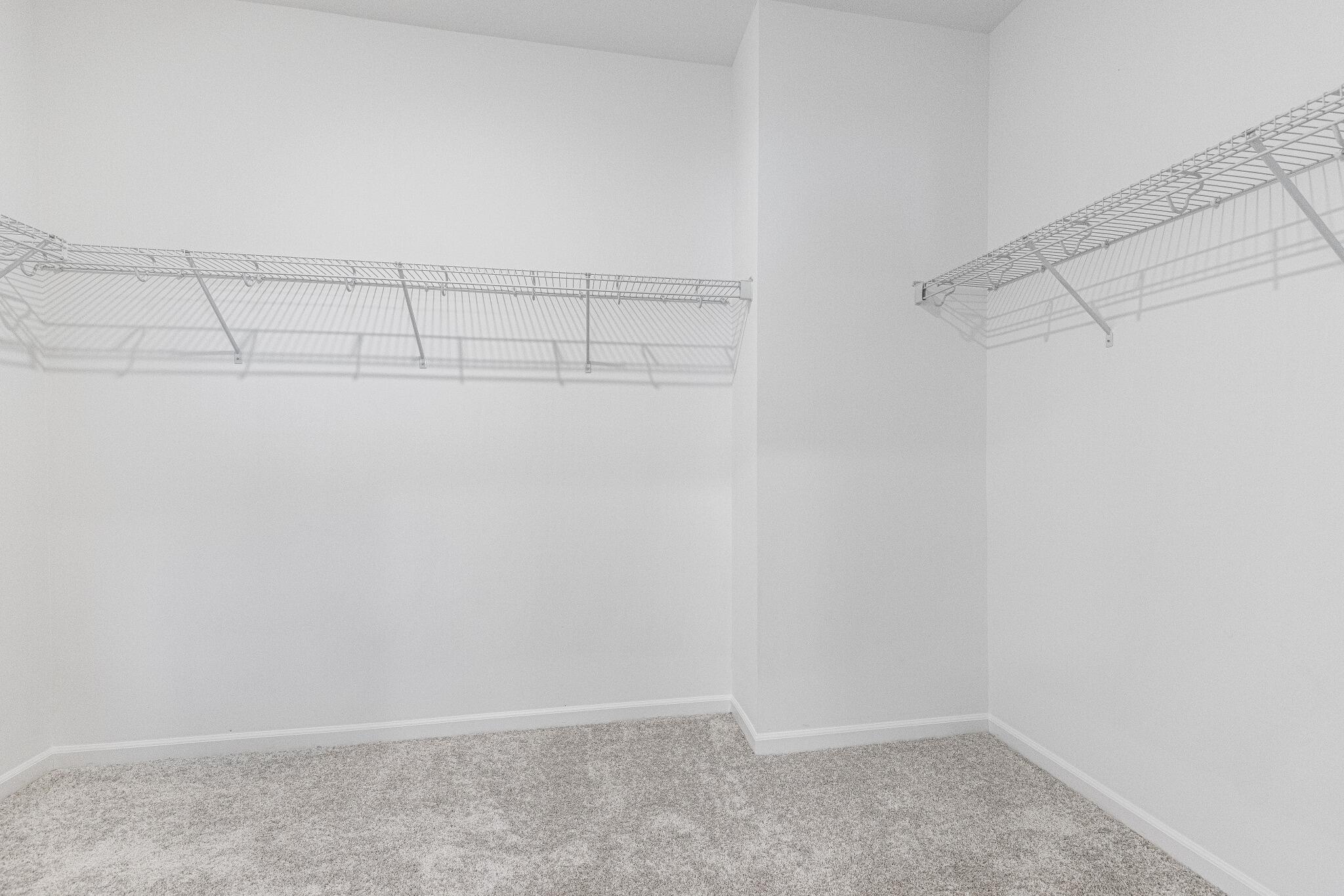 5948 East 112th Avenue Winfield, IN 46307 - Photo 19 of 36 a view of a room with racks on the wall