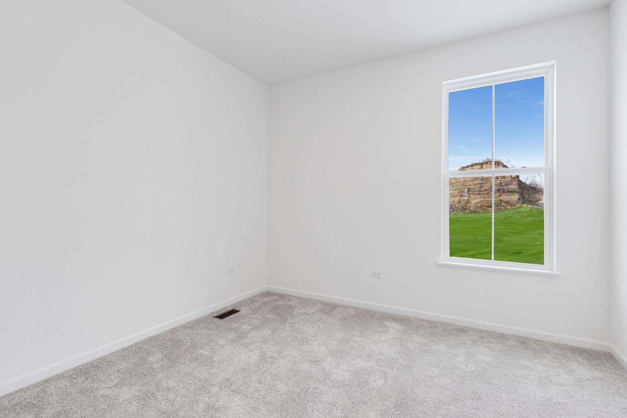 5948 East 112th Avenue Winfield, IN 46307 - Photo 22 of 36 an empty room with a window