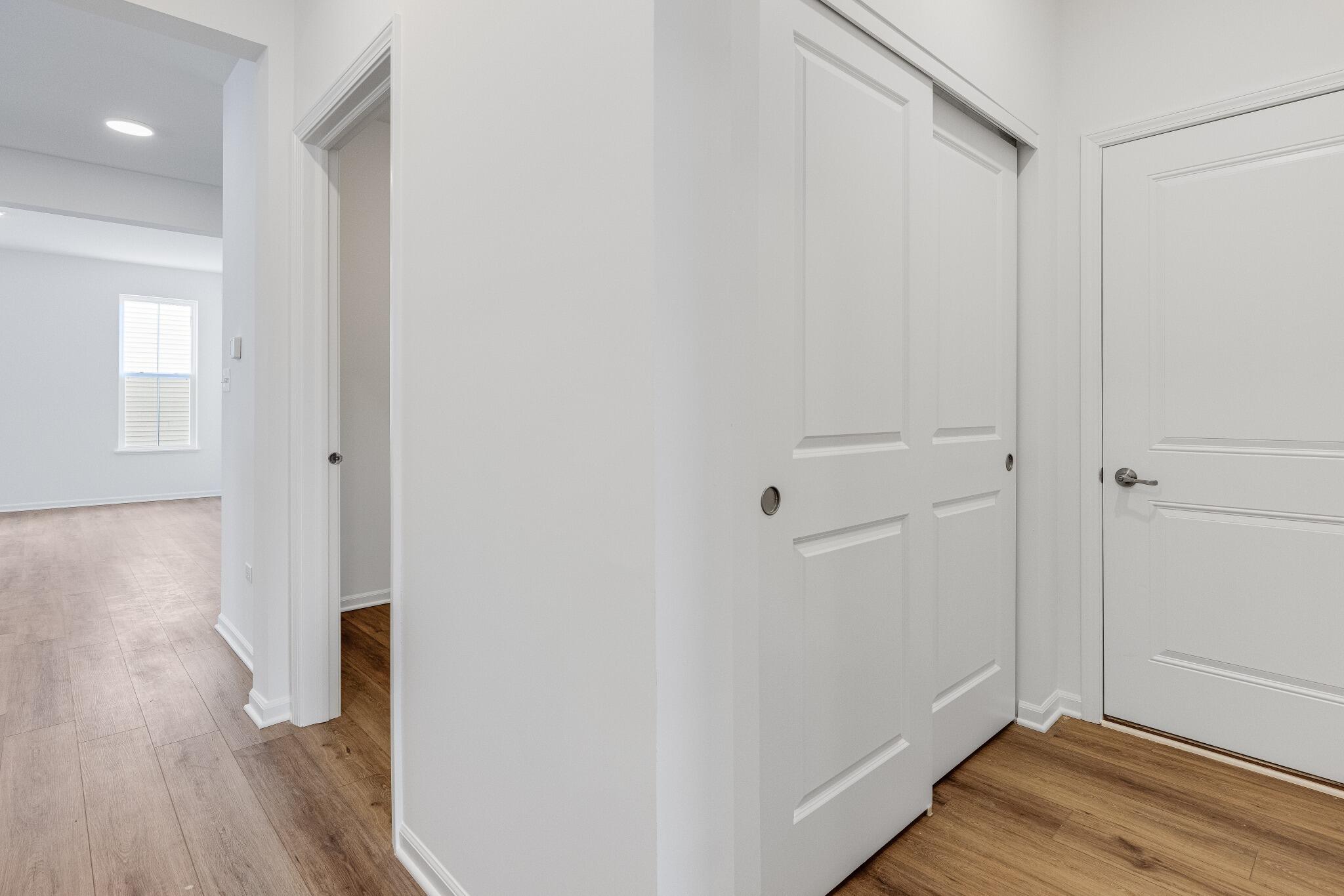 5948 East 112th Avenue Winfield, IN 46307 - Photo 25 of 36 a view of hallway with wooden floor