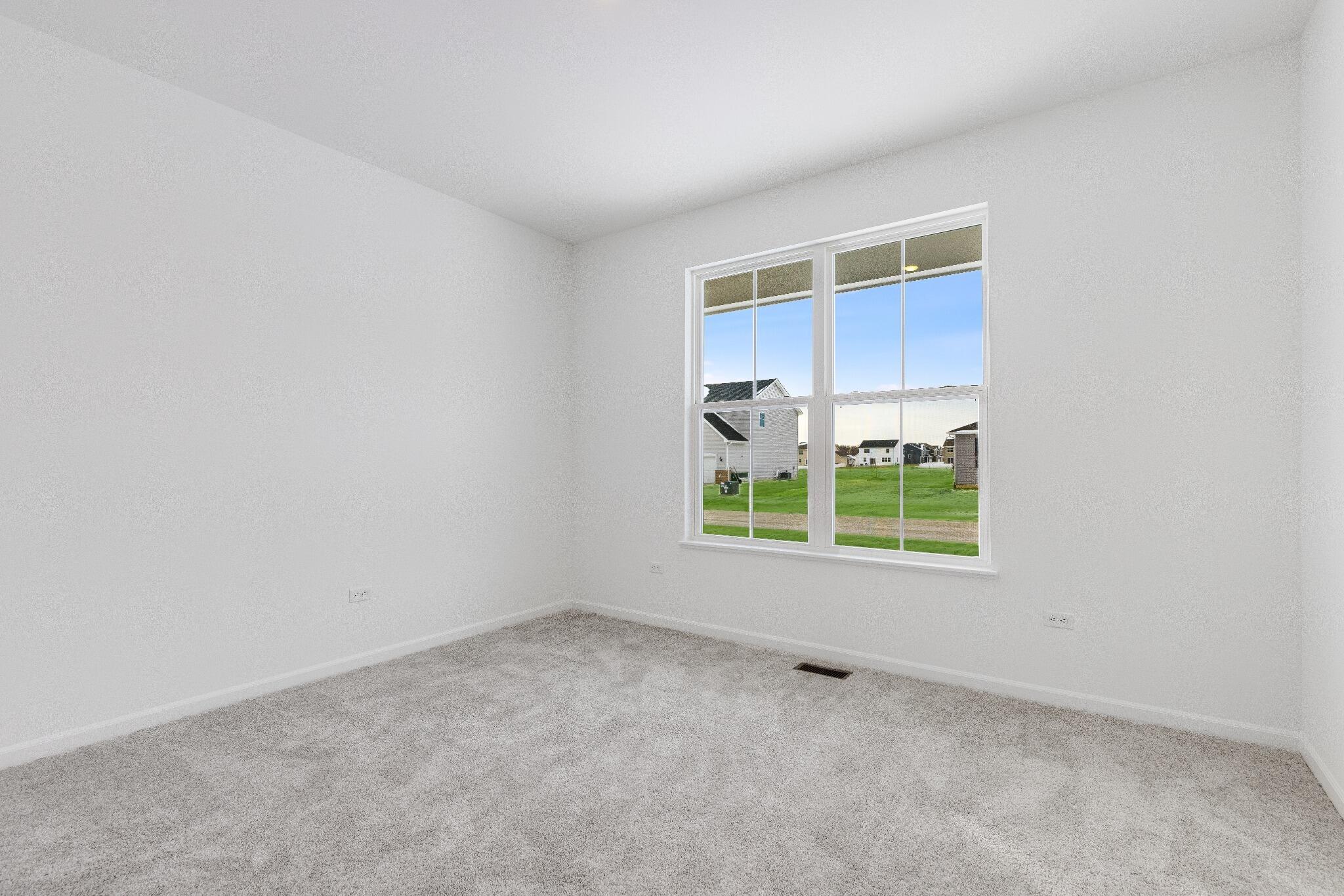 5948 East 112th Avenue Winfield, IN 46307 - Photo 5 of 36 an empty room with a window