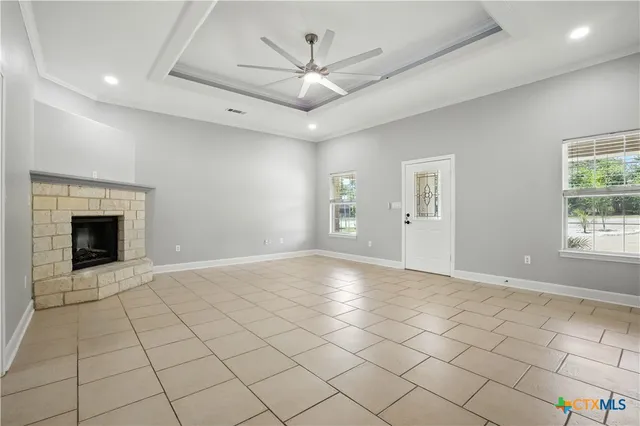 a view of an empty room and window