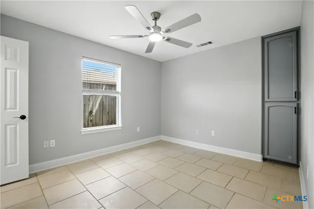 a bathroom with a sink double vanity and a mirror