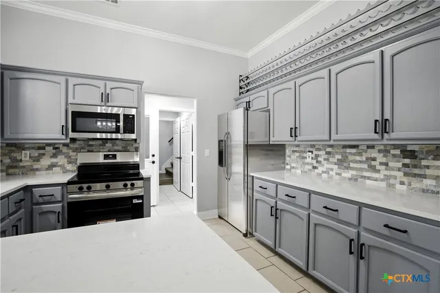 a room with furniture and window