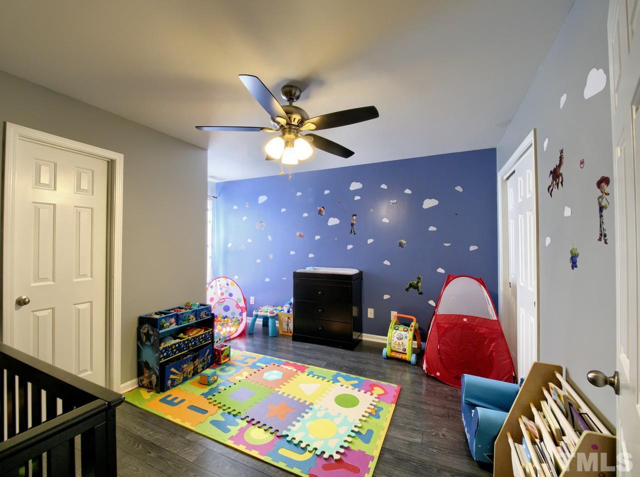 2609 Forest Shadows Lane Raleigh, NC 27614 - Photo 14 of 19 Both secondary bedrooms are generous in size and share a Jack and Jill bathroom.