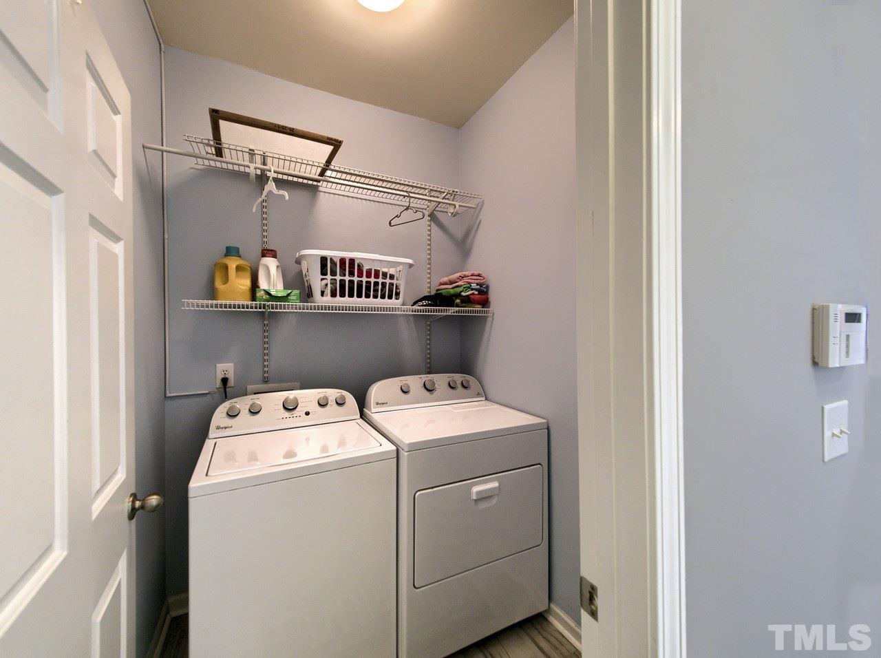 2609 Forest Shadows Lane Raleigh, NC 27614 - Photo 6 of 19 Updates include porcelain tile flooring, paint, shelving and the washer and dryer are included!