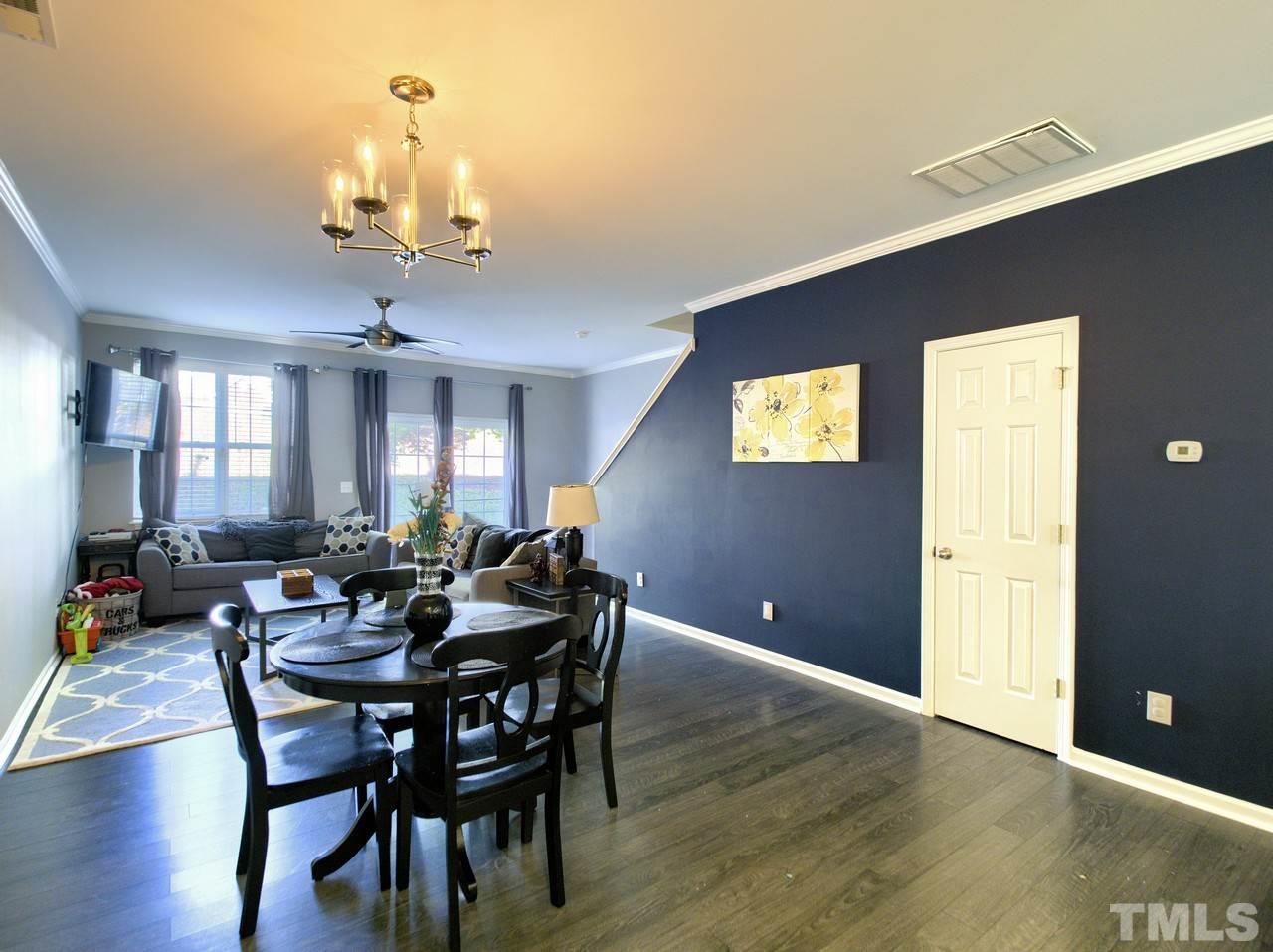 2609 Forest Shadows Lane Raleigh, NC 27614 - Photo 7 of 19 This gracious open concept living area overlooks a private patio. Updates include luxury vinyl plank flooring, lighting and paint.