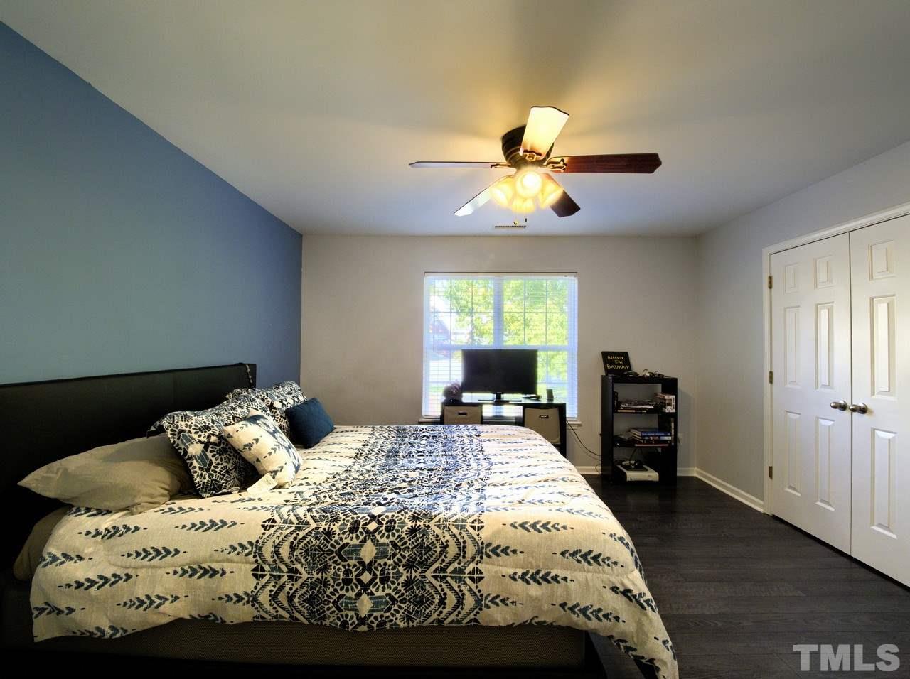 2609 Forest Shadows Lane Raleigh, NC 27614 - Photo 10 of 19 Updated luxury vinyl tile flooring and paint grace this spacious master suite.