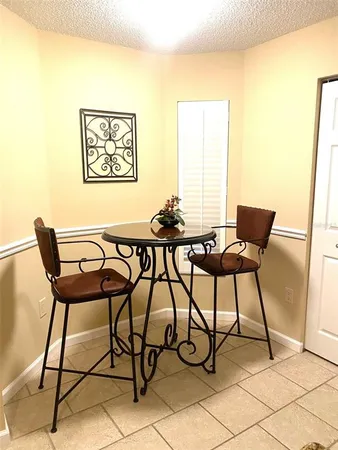 a table and chairs in a room