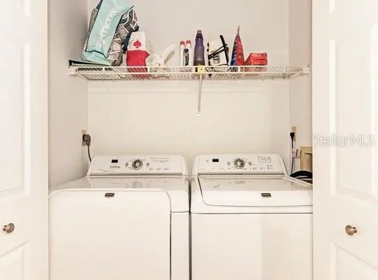 a utility room with dryer and washer