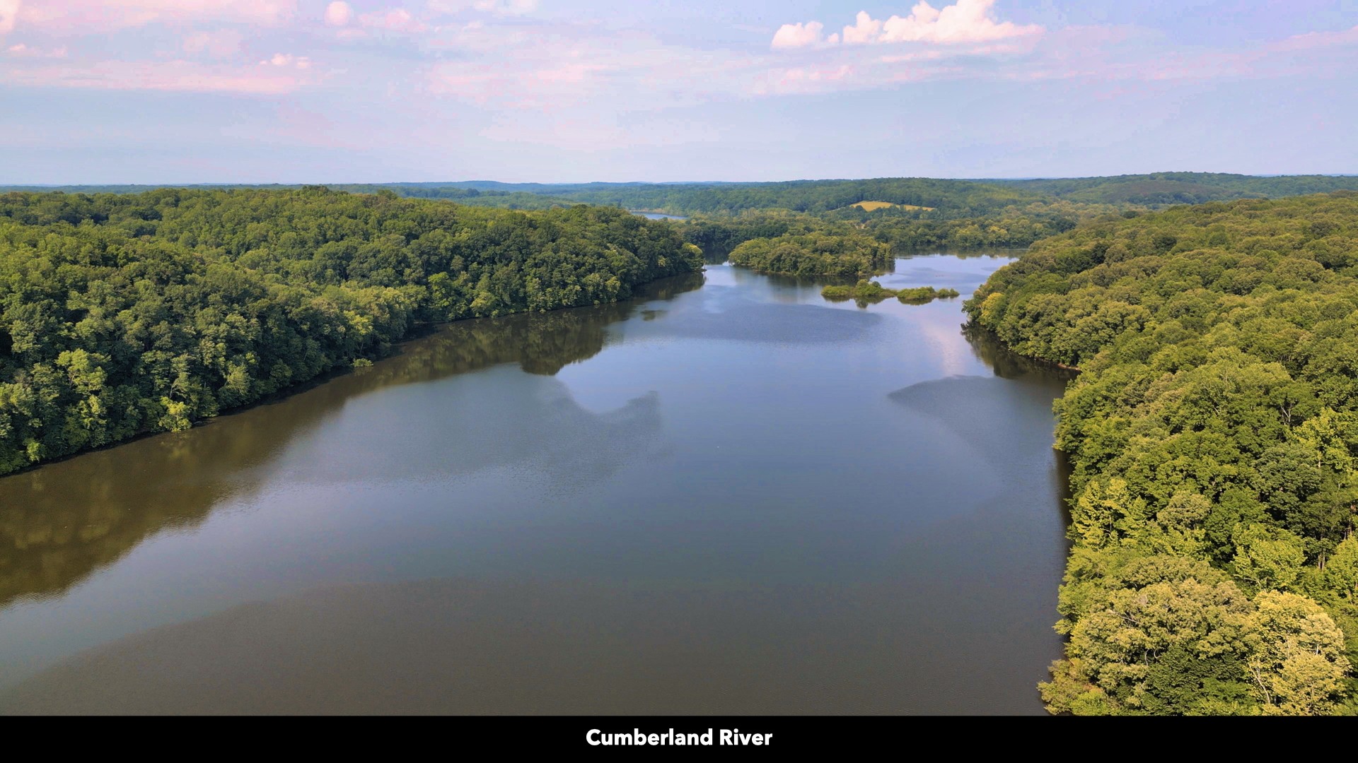 0 Freedom Ridge Indian Mound, TN 37079 - Photo 22 of 51 a view of a lake with a yard