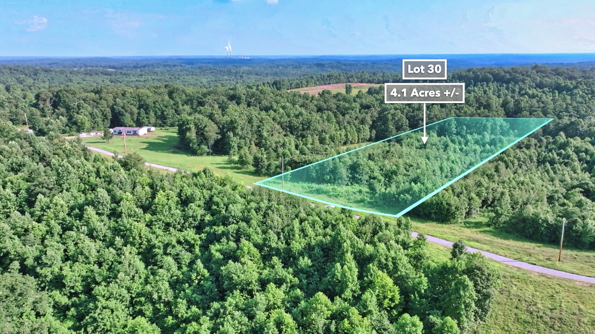 0 Freedom Ridge Indian Mound, TN 37079 - Photo 26 of 51 a view of a street with a yard and a wooden fence