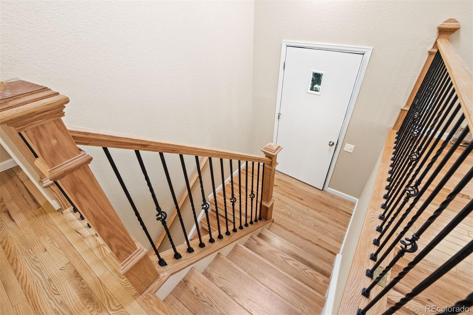 122 South Random Road Bailey, CO 80421 - Photo 17 of 38 a view of a balcony with wooden floor