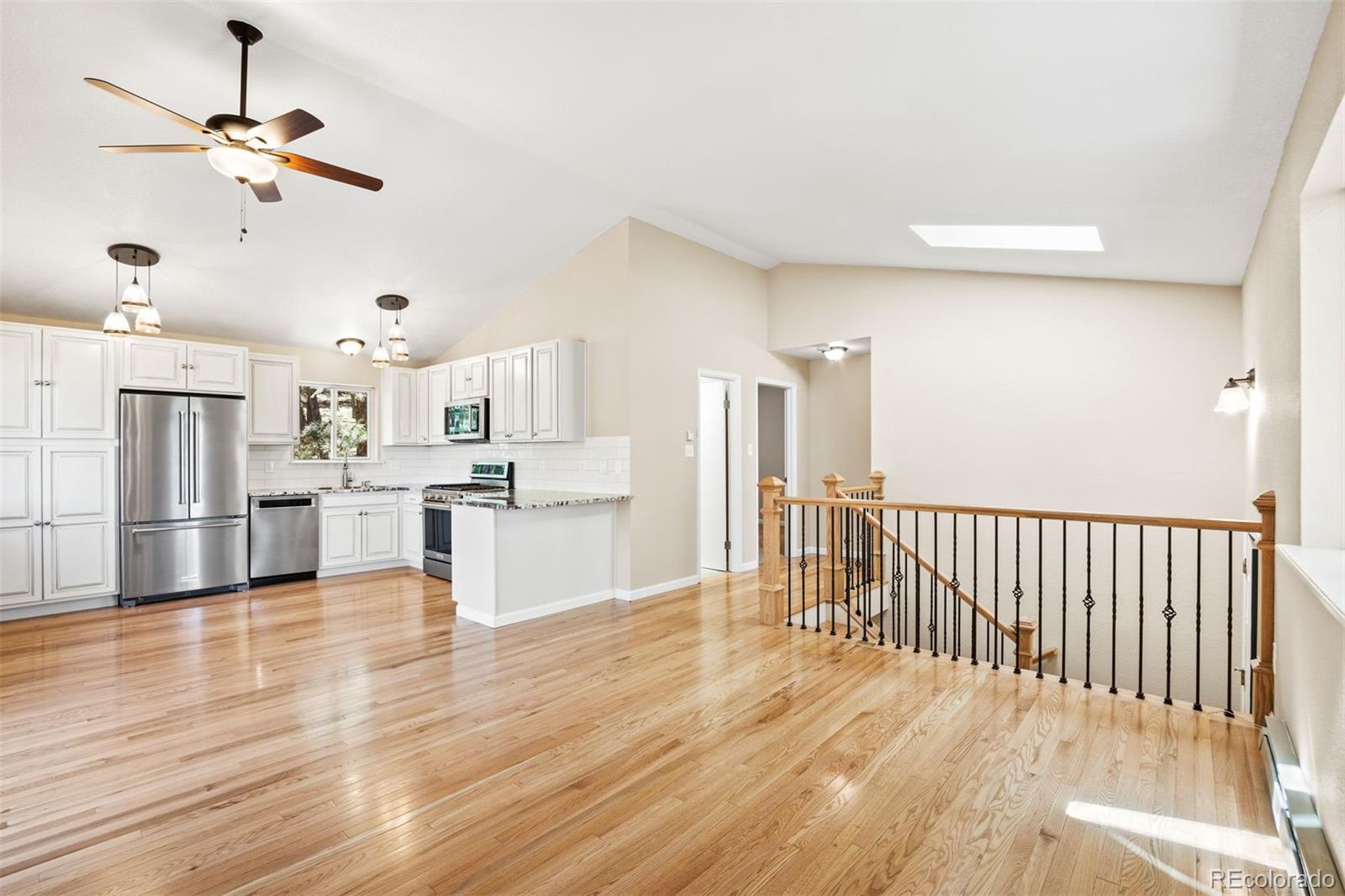 122 South Random Road Bailey, CO 80421 - Photo 8 of 38 a view of kitchen with wooden floor