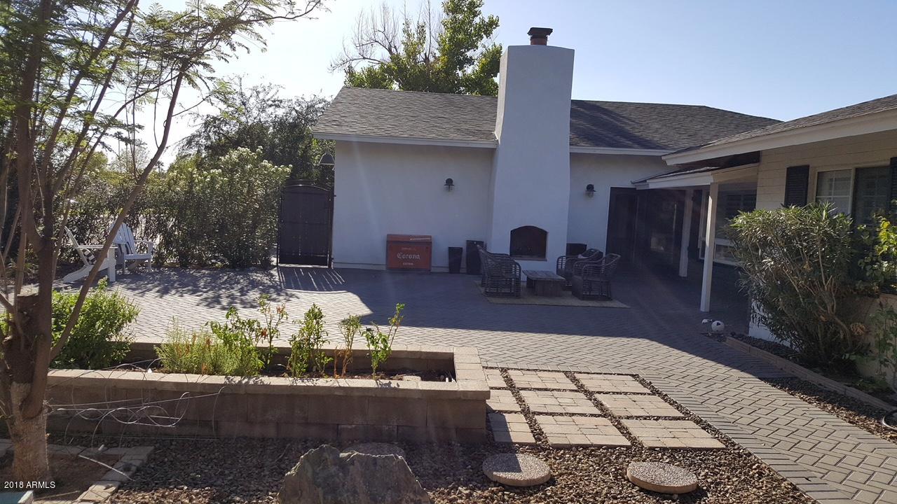 5110 East Osborn Road Phoenix, AZ 85018 - Photo 4 of 52 Front Garden & Fireplace