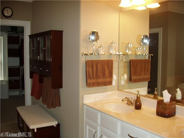 1700 Rita Court Oak Ridge, NC 27310 - Photo 7 of 16 Master Bath/Spa. Double Vanity and water closet.