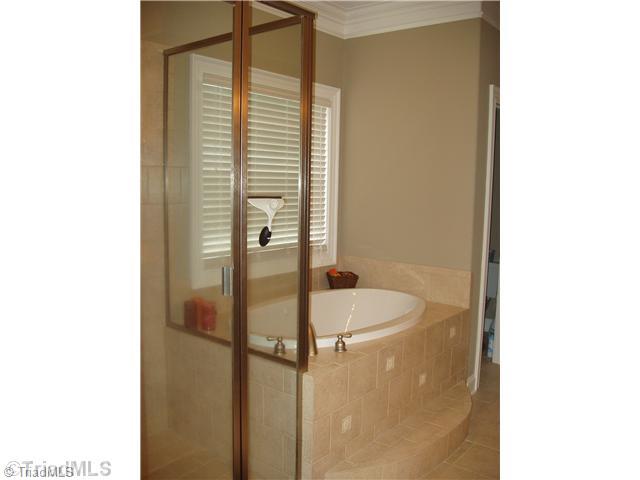 1700 Rita Court Oak Ridge, NC 27310 - Photo 8 of 16 Master Bath/Spa. Tile Floors and surround. Garden tub