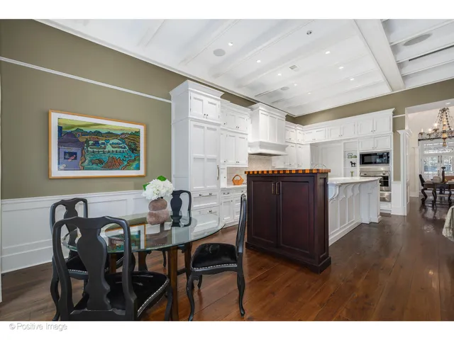 a bathroom with a granite countertop sink a mirror and a shower