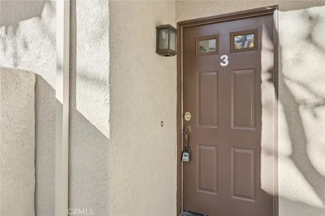 a bathroom with a shower and a mirror