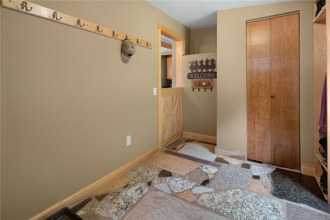 5903 Howell Road Locke, NY 13092 - Photo 4 of 31 Granite-floored entry foyer