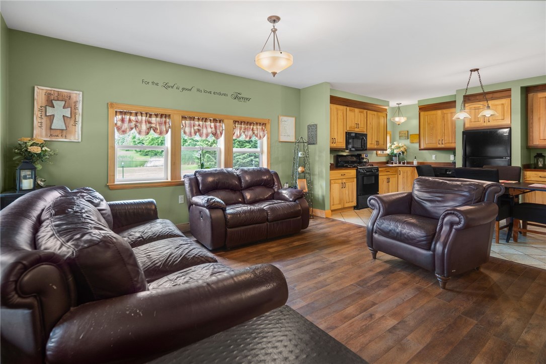 5903 Howell Road Locke, NY 13092 - Photo 8 of 31 The open layout flows seamlessly into an eat-in ki