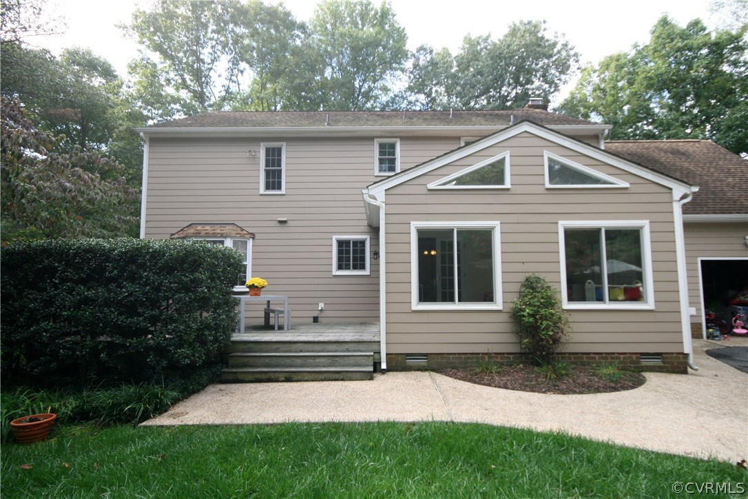 12720 Foxstone Road Midlothian, VA 23113 - Photo 20 of 21 a view of house with a yard and a garden