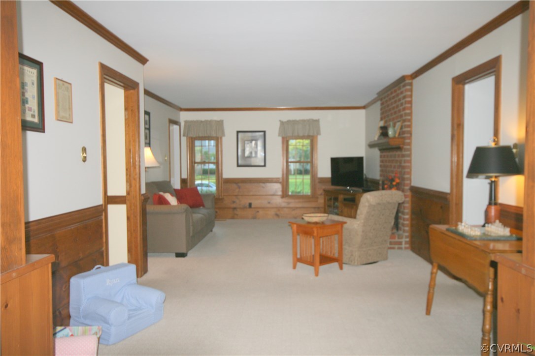 12720 Foxstone Road Midlothian, VA 23113 - Photo 3 of 21 a living room with furniture and a window