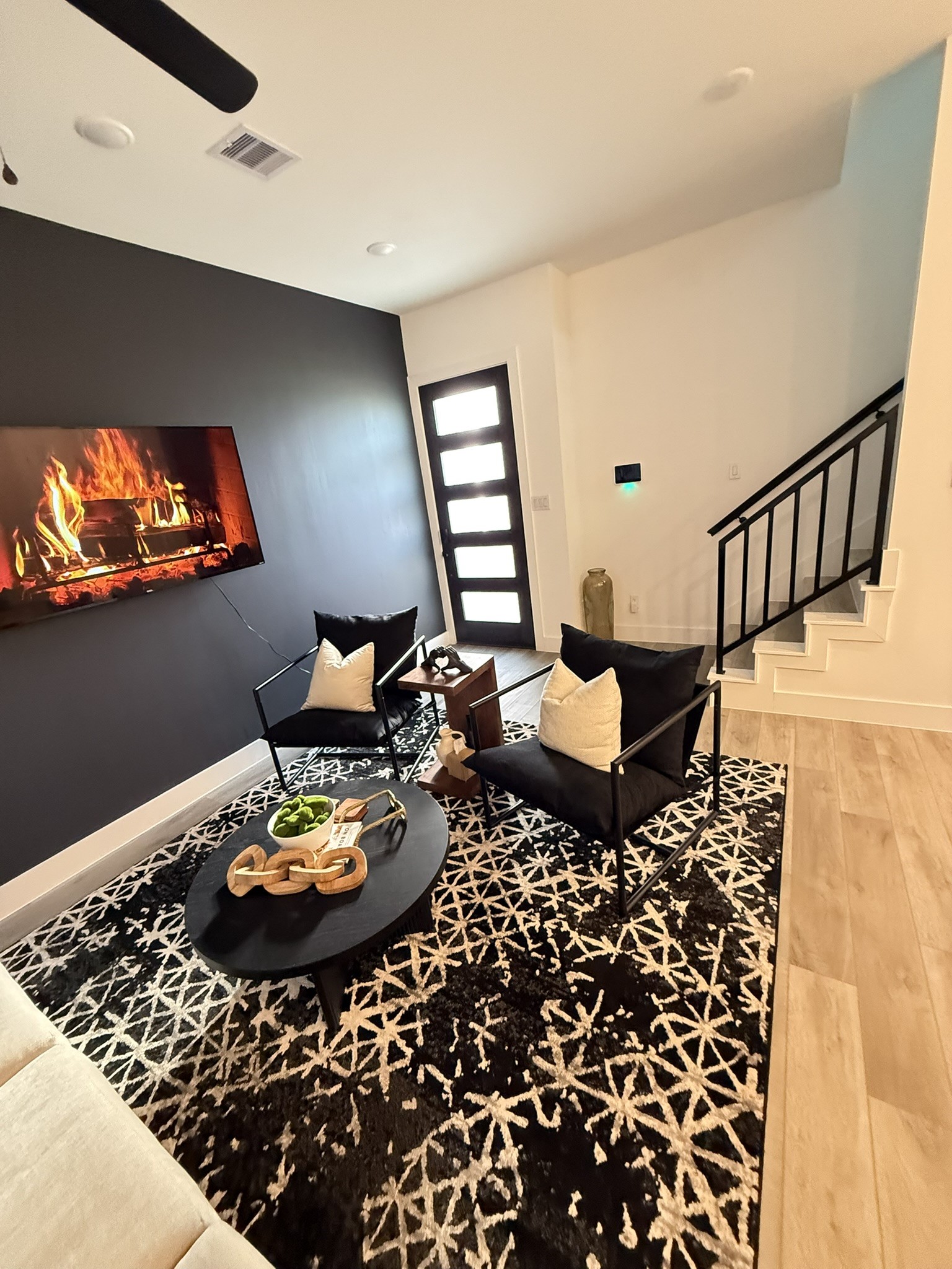 5527 Denmark Street, Unit B Houston, TX 77028 - Photo 22 of 40 a living room with furniture and a flat screen tv