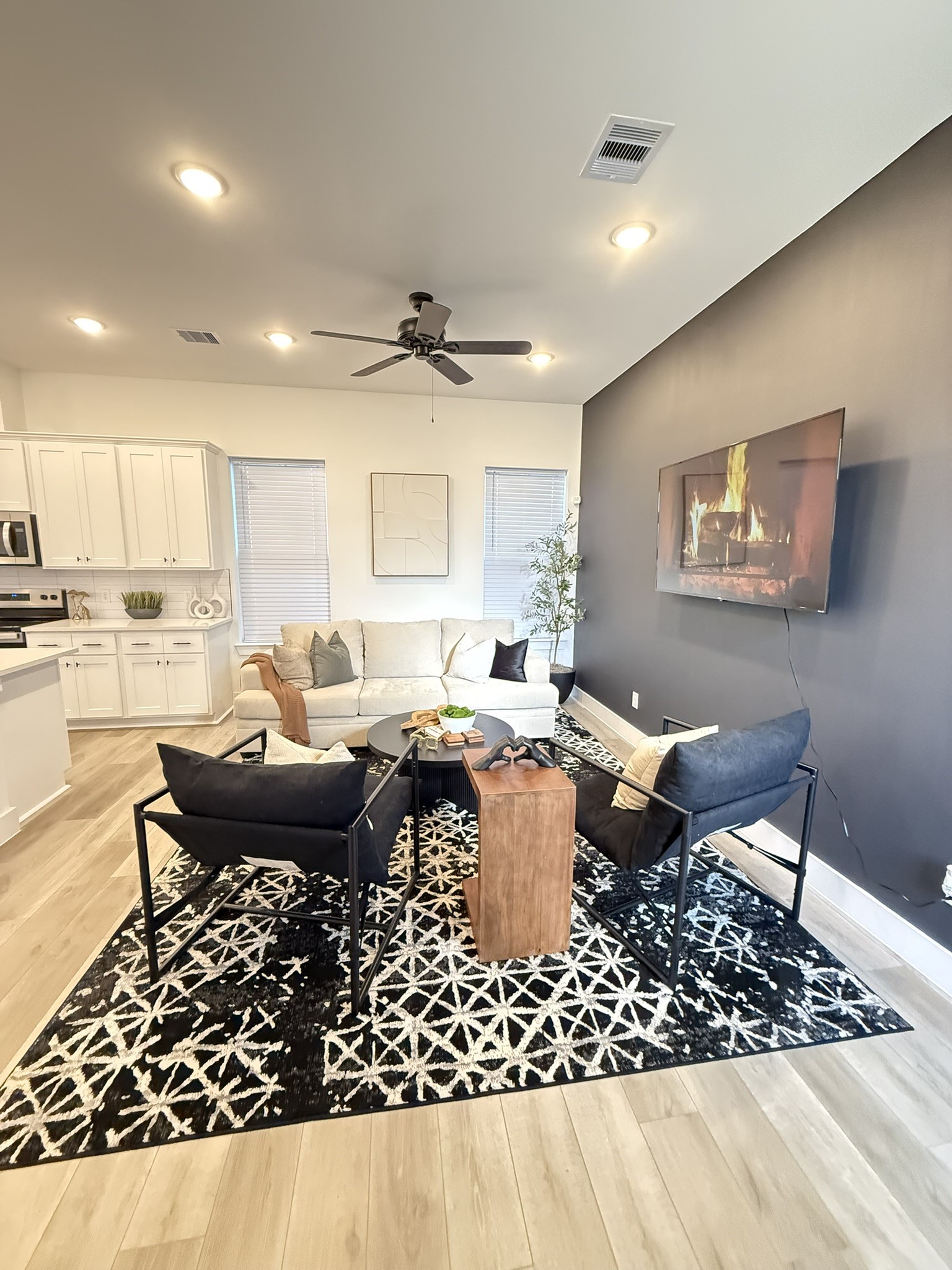 5527 Denmark Street, Unit B Houston, TX 77028 - Photo 29 of 40 a living room with a couch and a table