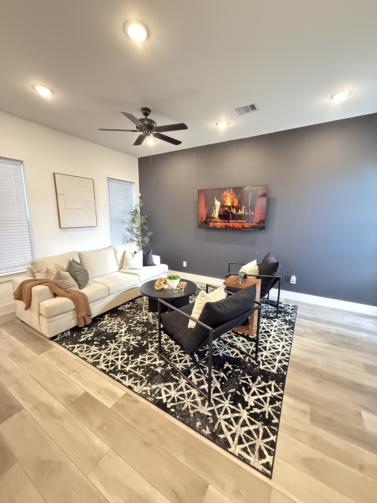 5527 Denmark Street, Unit B Houston, TX 77028 - Photo 30 of 40 a living room with a couch and a coffee table