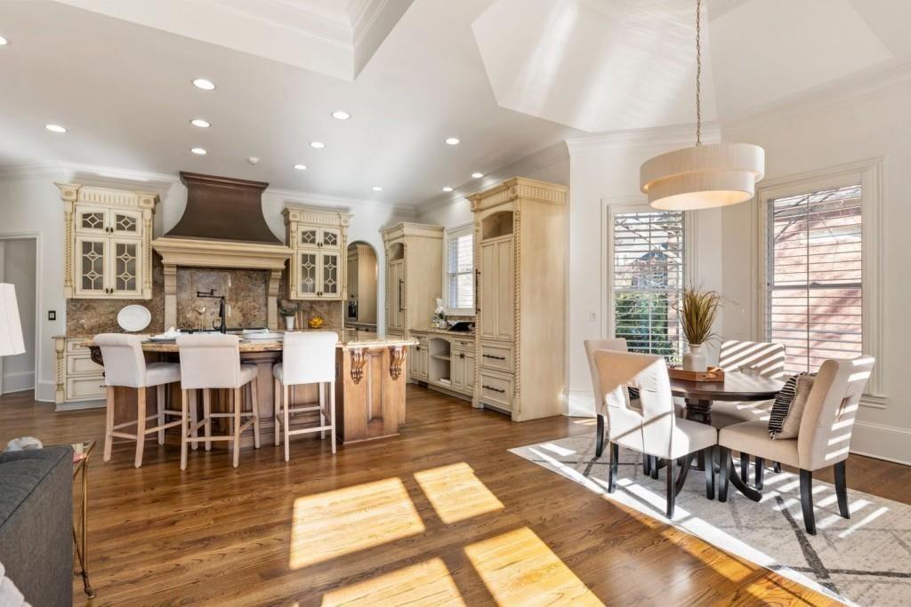 2250 Blackheath Trace Alpharetta, GA 30005 - Photo 19 of 51 a view of a dining room with furniture window and wooden floor